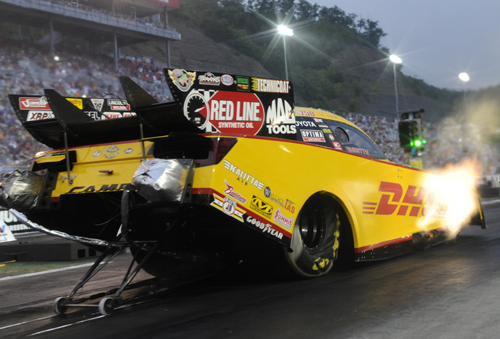 Del Worsham rode the DHL Toyota to both low ET and top speed of the meet in FC.