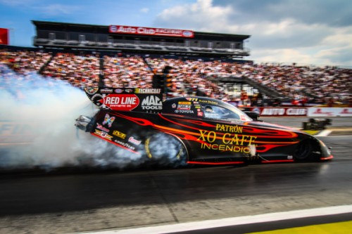 (Alexis DeJoria set low ET of the event at 3.998 secs)