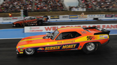 (That's Mark Sanders and Bob Godfrey racing in front of the capacity Castrol Raceway crowd!)